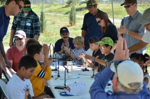 Youth enjoy learning to tie flies at an event sponsored by The Greenbacks.