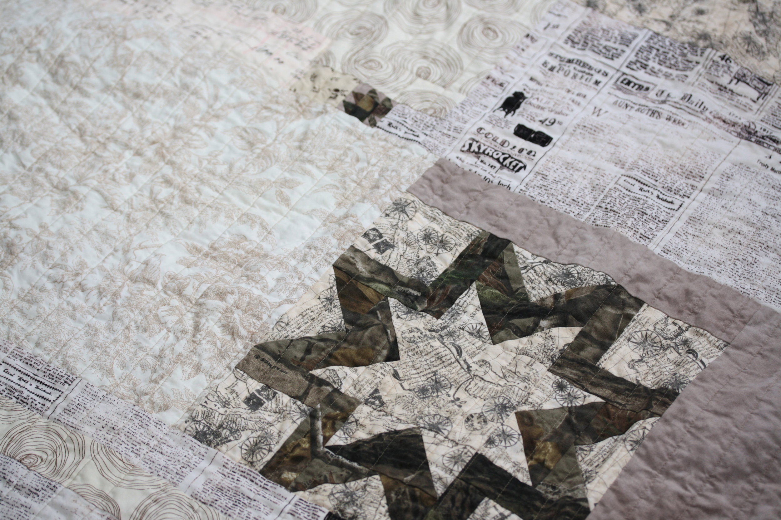 camouflage star and tiny leaf on quilt