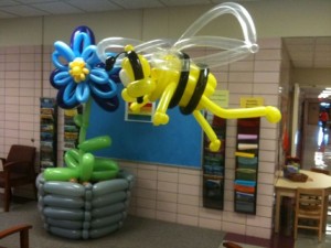 Winslow Elementary bee mascot and flower by Airigami