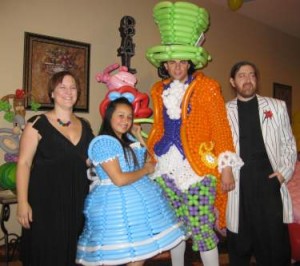 Alice and the Mad Hatter played by Jacqueline Hernandez and Sheldon Blake. Also pictured, designers Larry Moss and Kelly Cheatle.