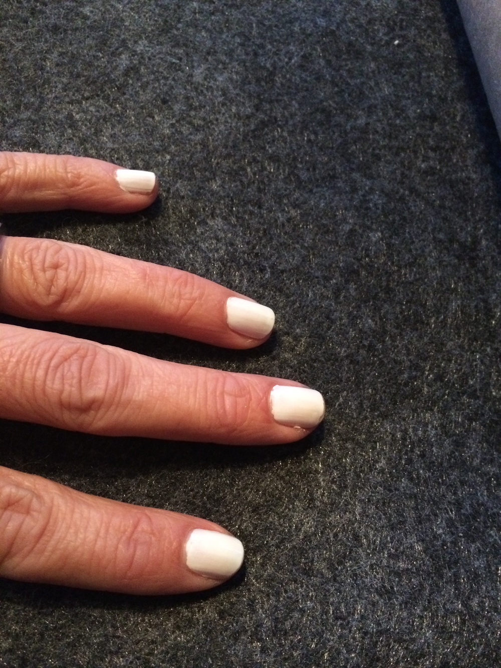  My white nails 1 week after my manicure using Covergirl Snow Storm & Deborah Lippman as a base and top coat. 