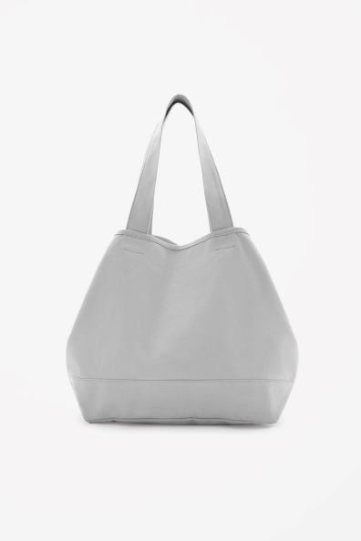  Cotton beach bag. Available in grey, yellow. COS. $45. 