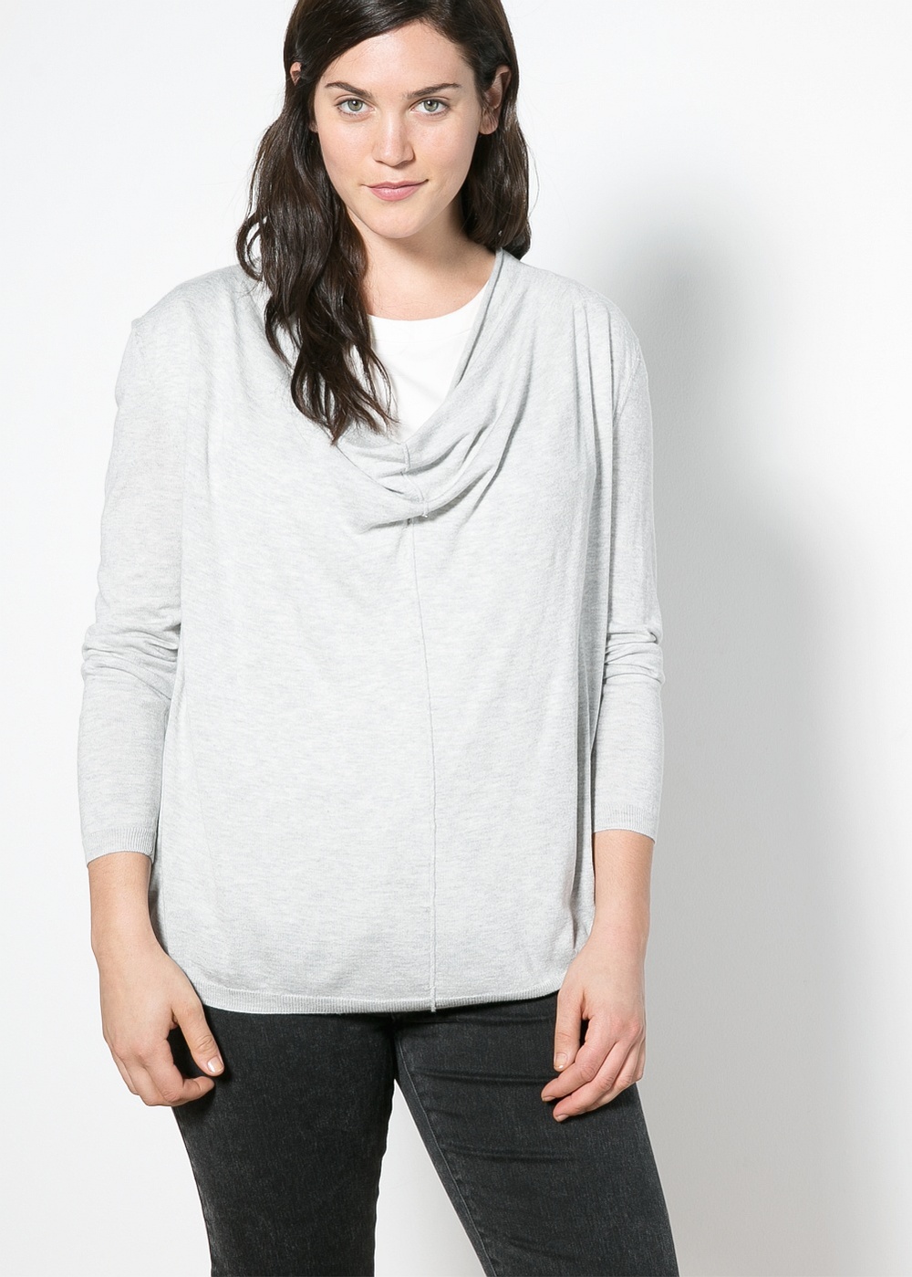  Simple neutral pieces are a perfect balance to more unique or daring pieces.  Draped neck sweater. Violeta by Mango. $59.99 