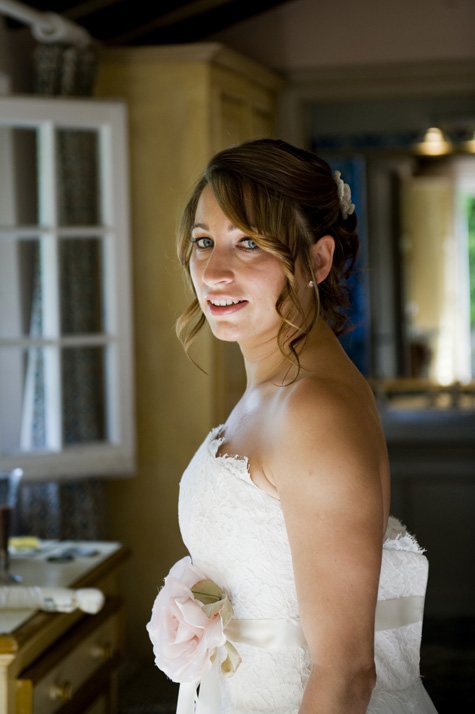 The bride in her beautiful wedding dress - photo by Pearl Pictures