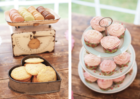 Biscuits, macaroons and a cake stand with cupcakes