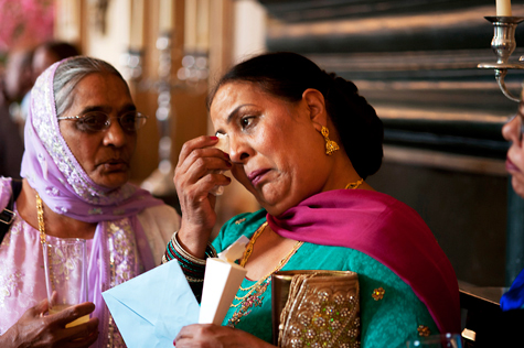 Teary mother of bride with relative