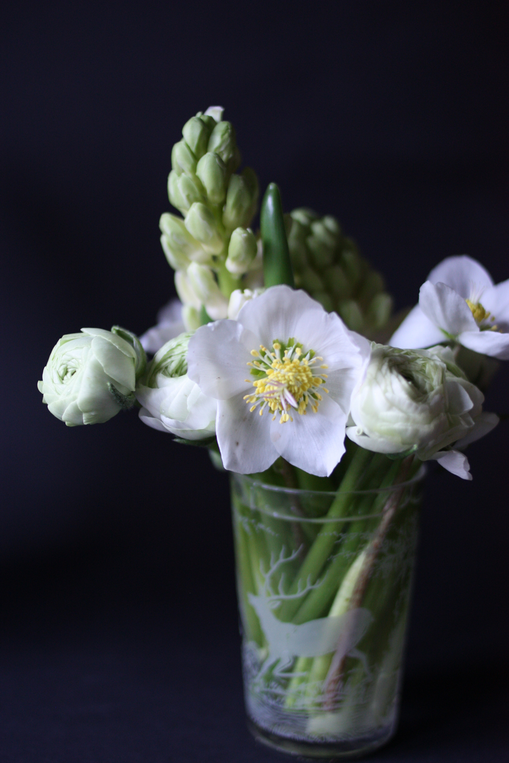 small white bouquet in a transparent vase