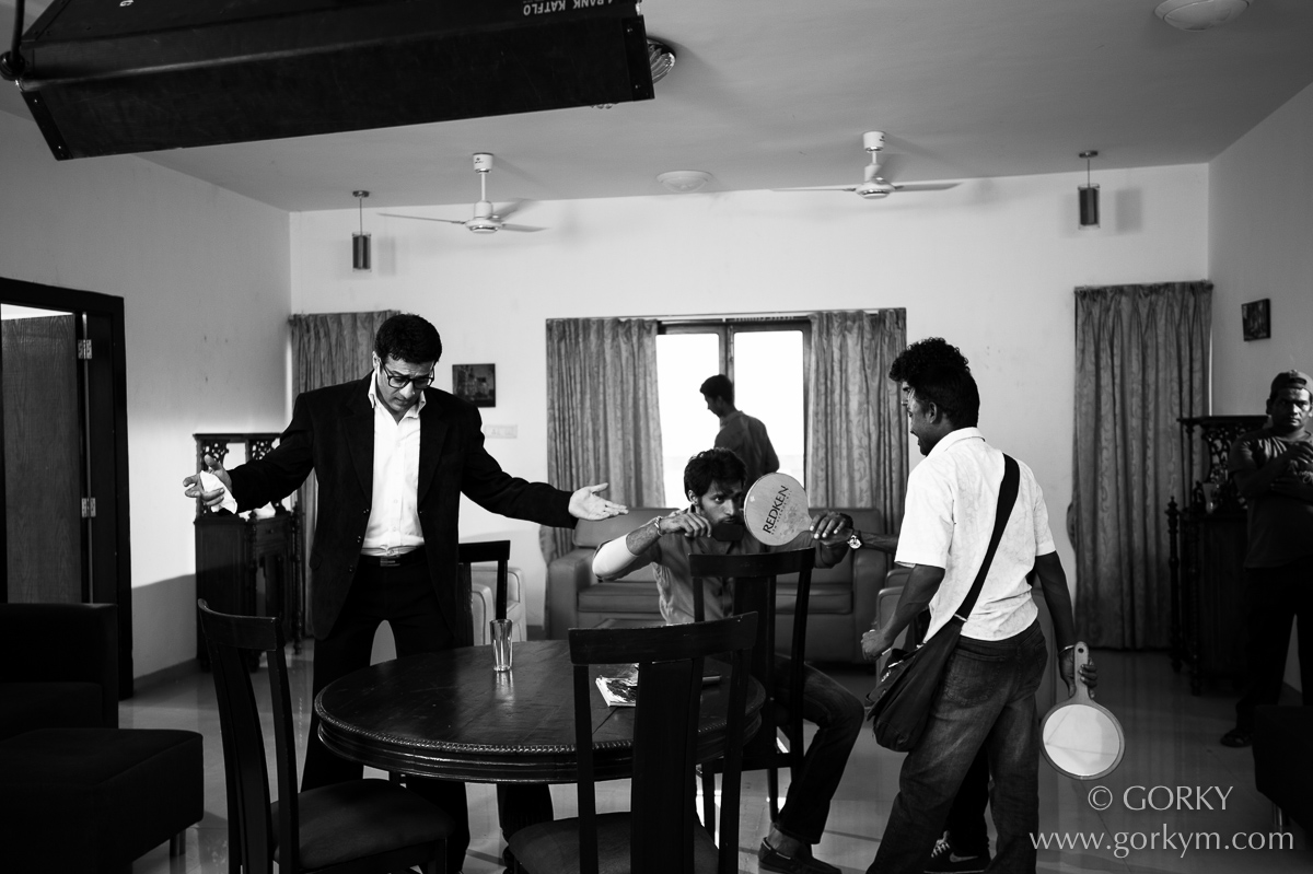 Just before a shot - Sachin Verma rehearses his lines and actions while Shaleen Malhotra puts his hair in place.