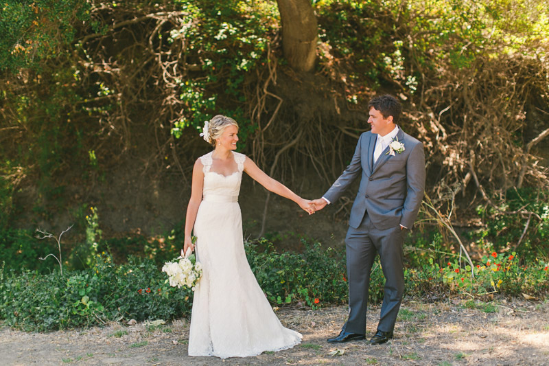Cayucos Creek Barn, Bride and Groom holding hands