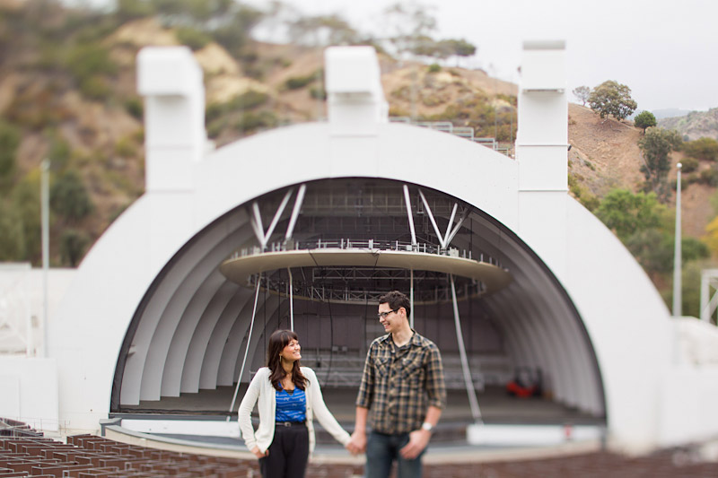 Hollywood Bowl, Wedding photography, engagement photos of couple holding hands in front of stage (1 of 2)