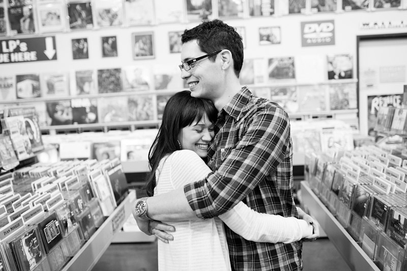 Hollywood, Wedding photography, engagement photos of couple hugging in Amoeba Music Store