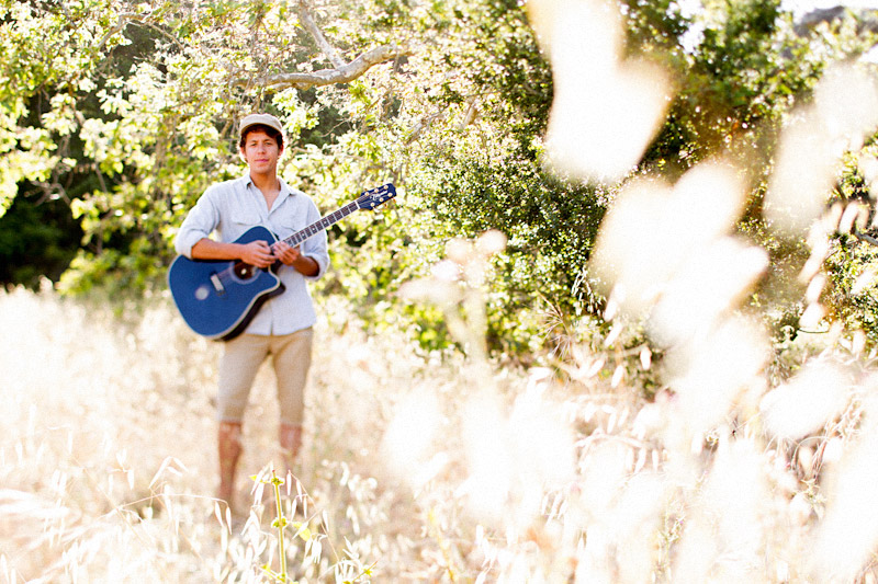 Joel VanZ central coast wedding videographer and musician hanging out in a field (7 of 8)  