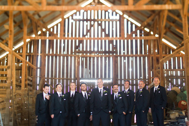 san luis obispo ranch wedding, portraits of the groomsmen in a barn