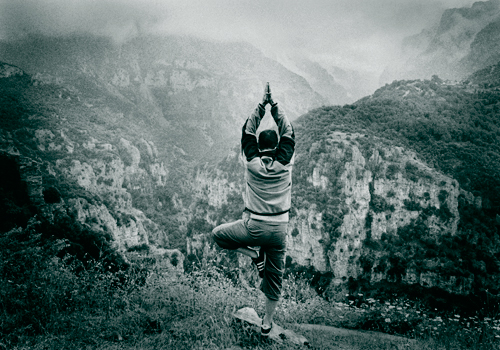 My feble Yoga pose on the lip of Vikos Gorge, Zagoria, North west Greece.