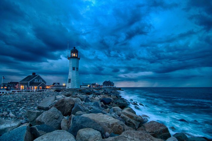 Rough weather and fantastic clouds at dusk in Scituate, Massachusetts, a coastal town is guarded by the Old Scituate Light. 