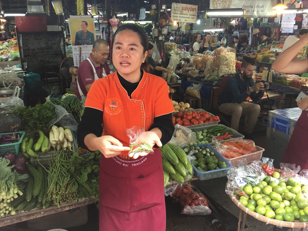 Our cooking instructor. She took us to the local mart and explained many of the common foods and ingredients they use in Thailand. 