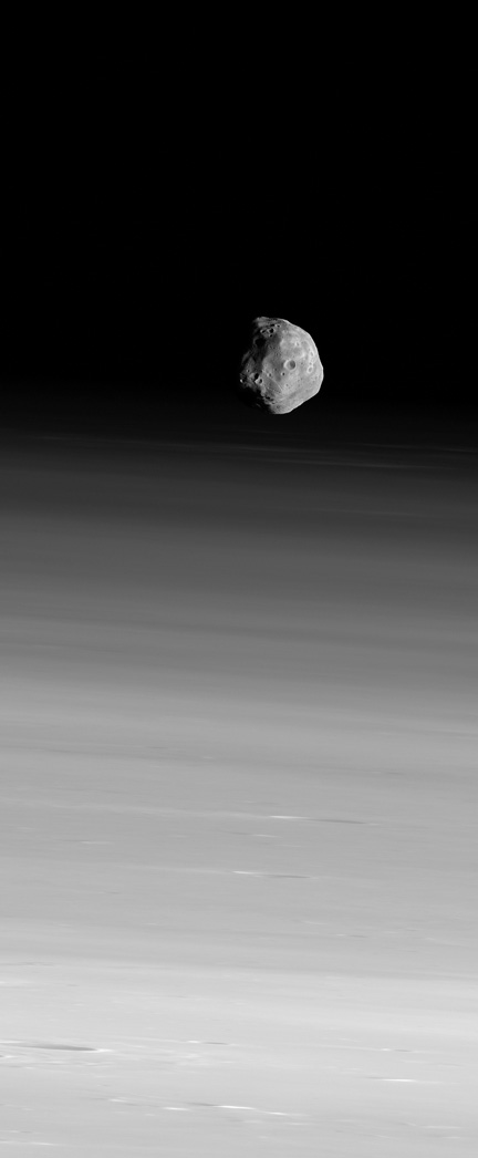 Phobos Hangs Above the Martian Horizon
