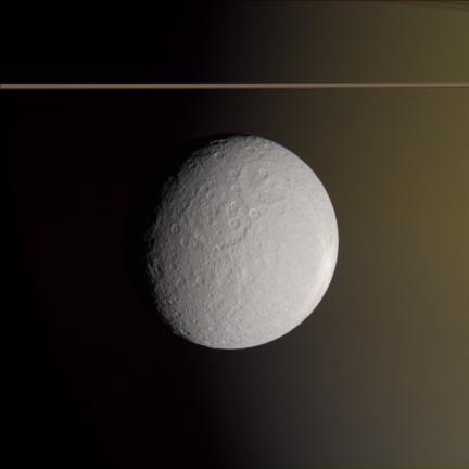 Color view of Rhea Against Saturn