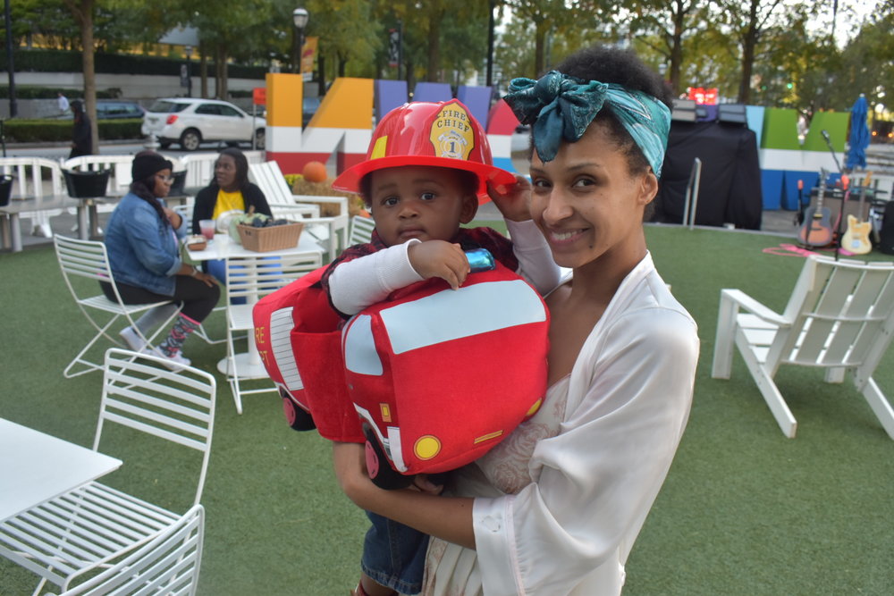  Baby’s first Halloween comes a day early | Honeycomb Moms | My son, Donovan, was a fire chief, and I was his victim at Midtown Atlanta’s Scare on the Square Tuesday. LAUREN FLOYD / INFO@HONEYCOMBMOMS.COM 