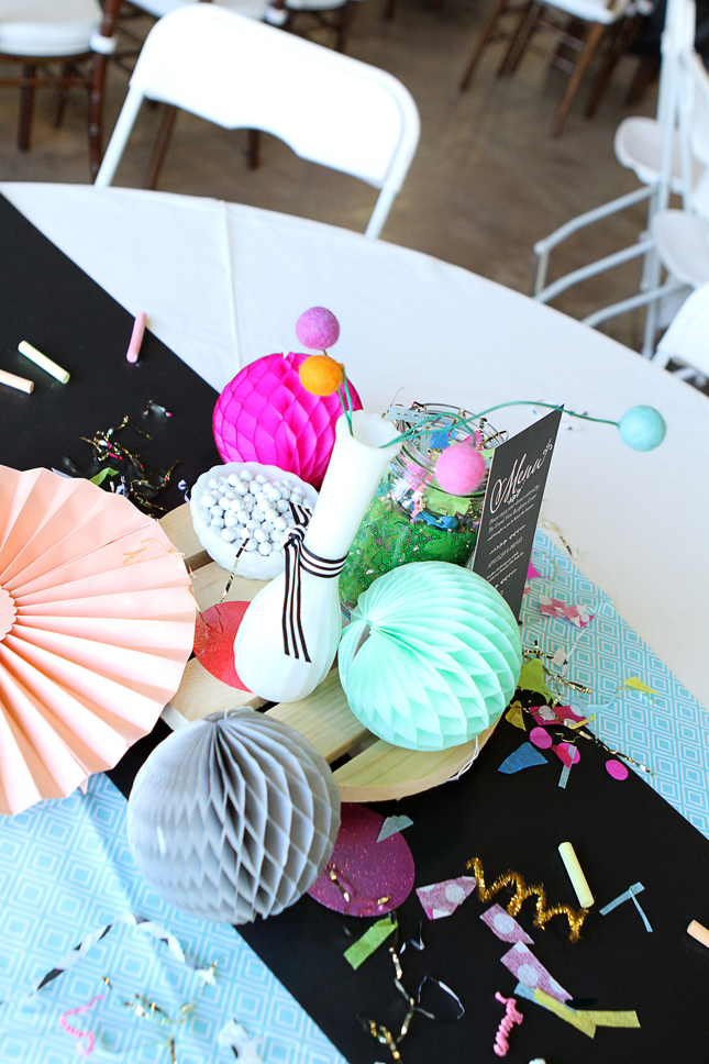 Handmade confetti and honeycomb tissue balls on tables at this awesome confetti party!