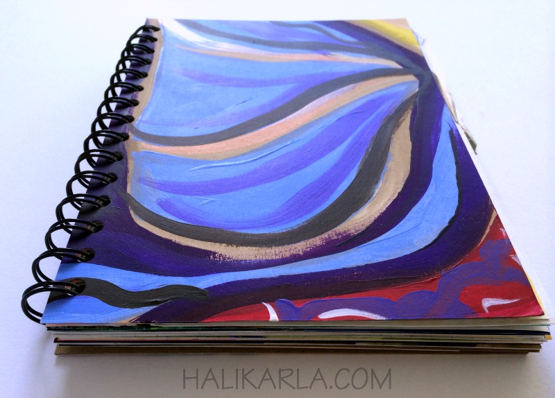 handmade art journal bound with upcycled and recycled papers and art, Hali Karla