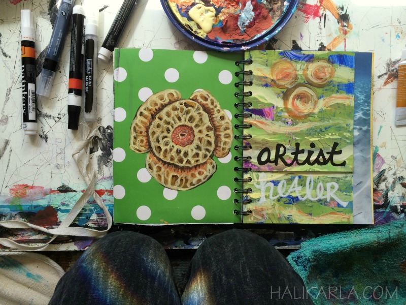 art journal page in process, altered book made of scraps and old paintings and old office supplies, bound at home