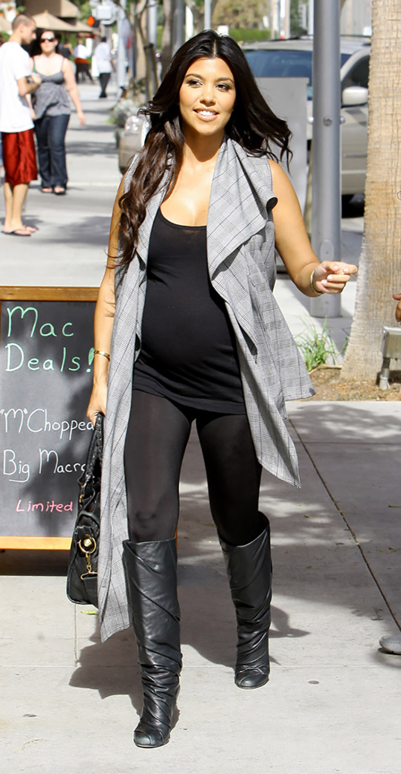 Pregnant Kourtney Kardashian shopping in Beverly Hills, visiting baby clothing stores with her boyfriend, Scott Disick, and sister. They then went to Robertson Boulevard and did some more shopping at Kitson for Kids. Los Angeles, California - 22.09.09