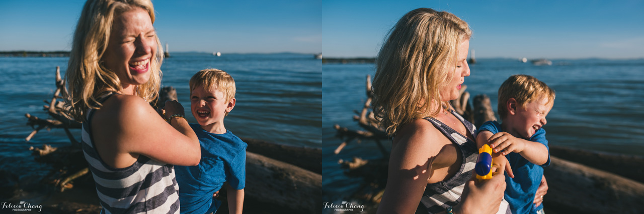boy squirting mommy with water gun, vancouver family photographer, Felicia Chang Photography