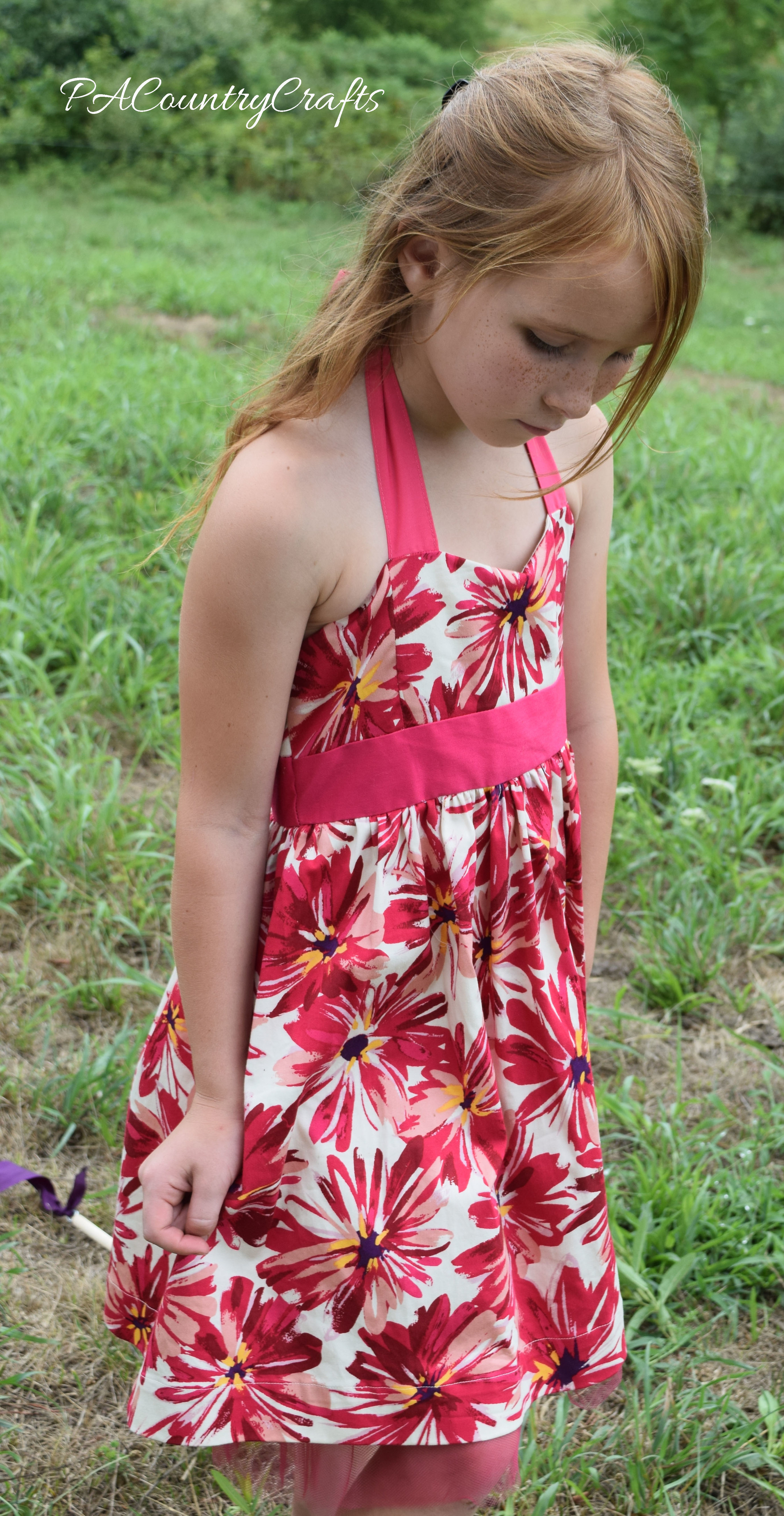 Take in a women's dress and add straps to make a girls' halter dress.