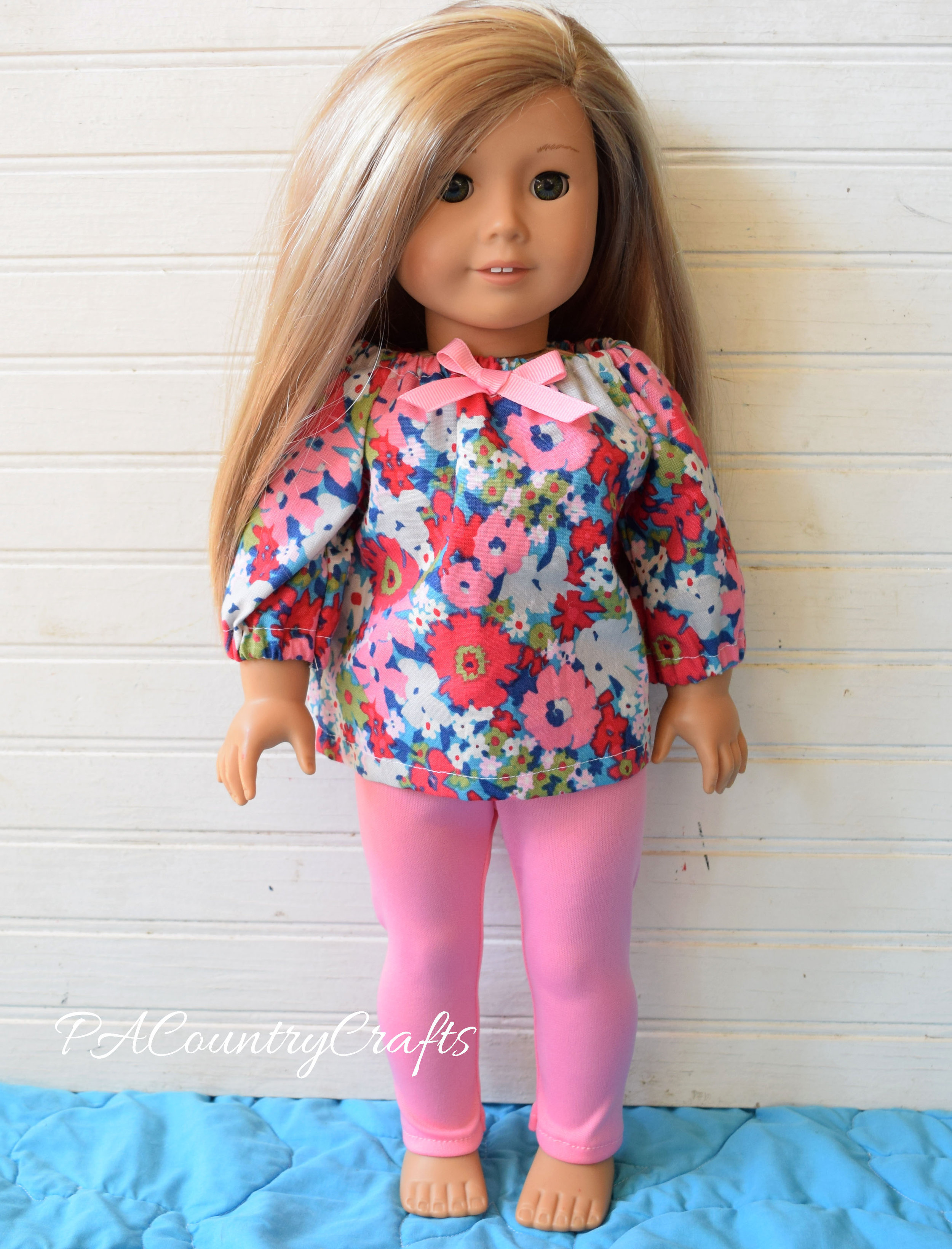 flowered doll top and pink leggings