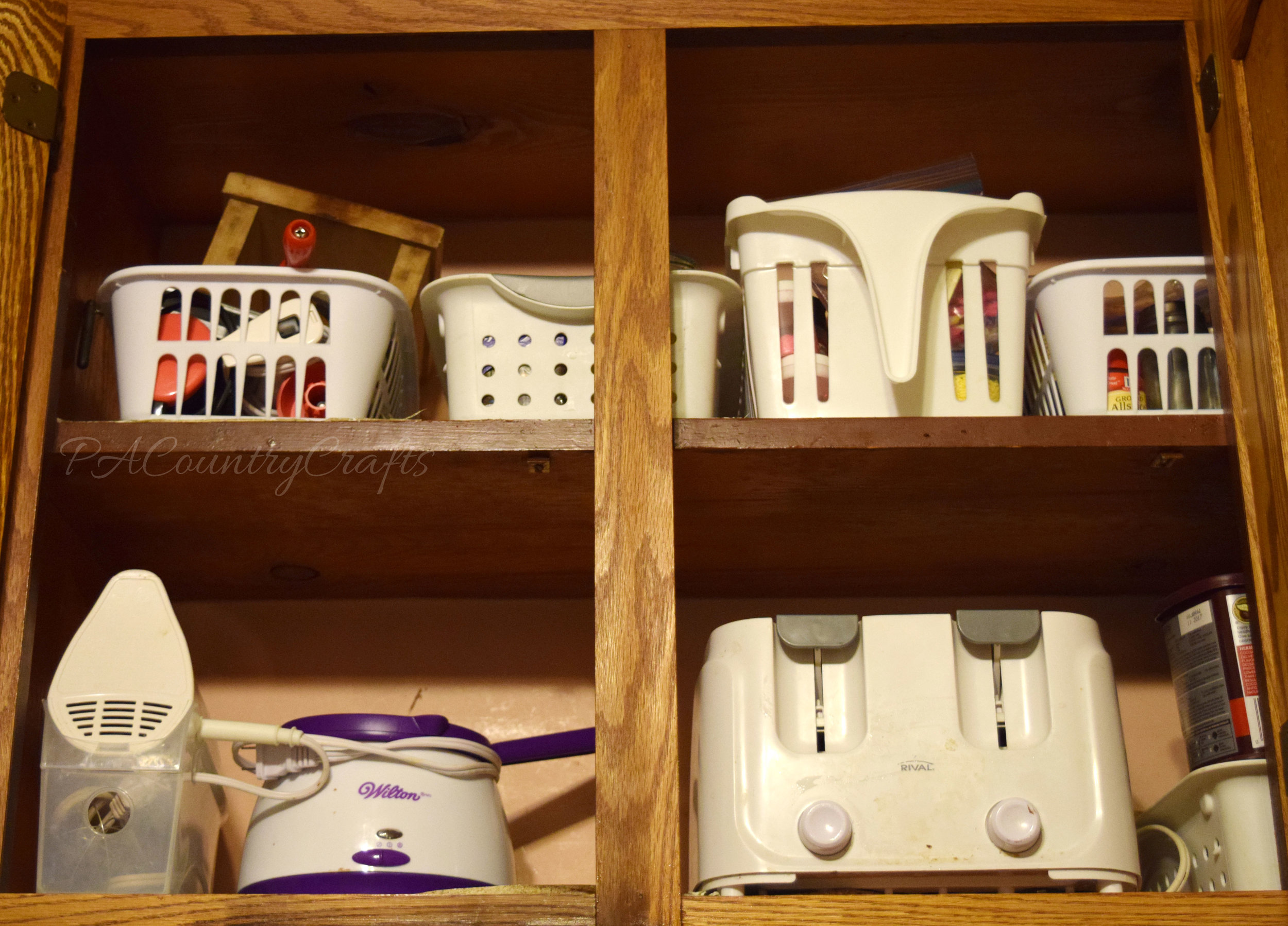 How to organize high cupboard shelves with plastic bins.