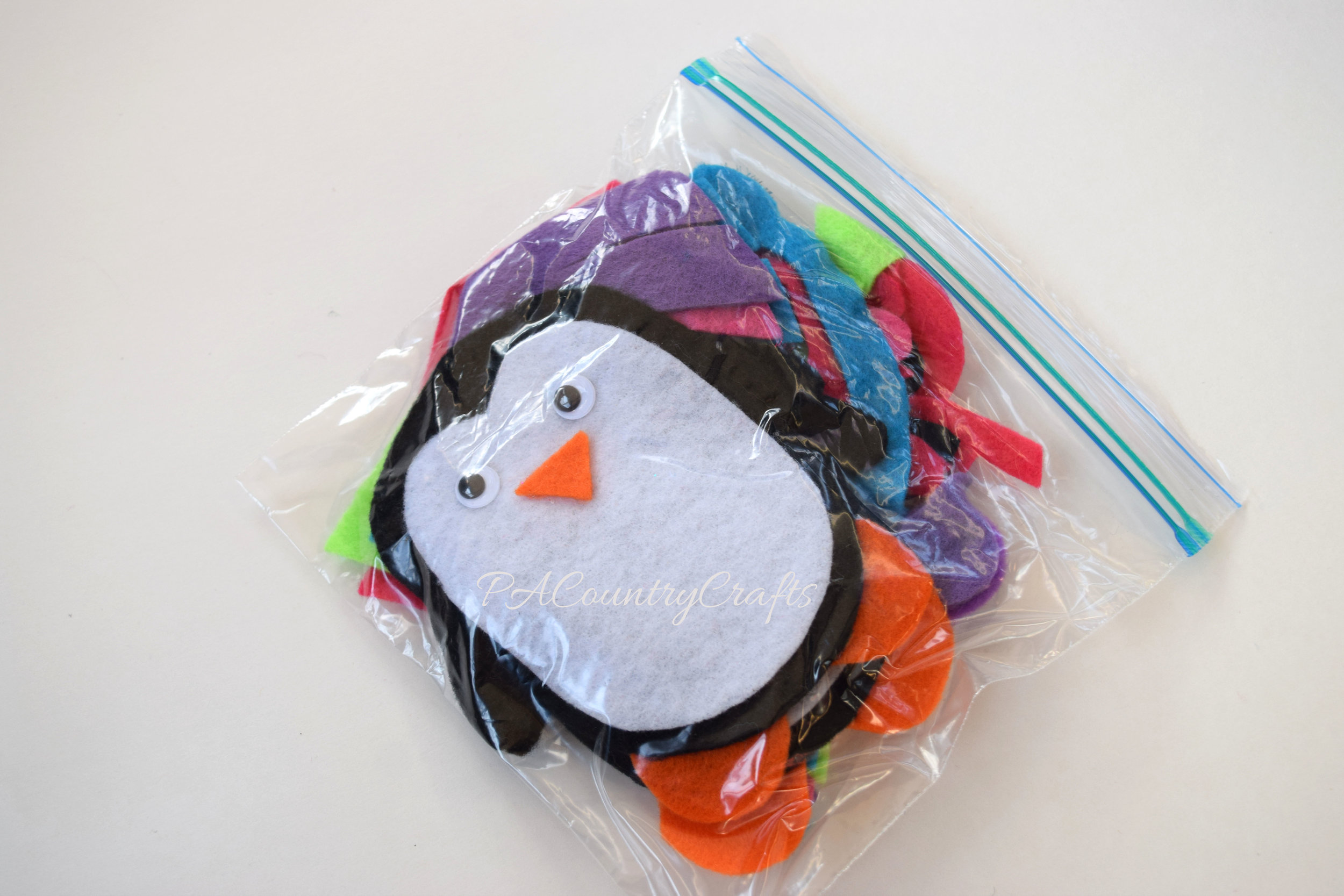 felt penguin busy bag