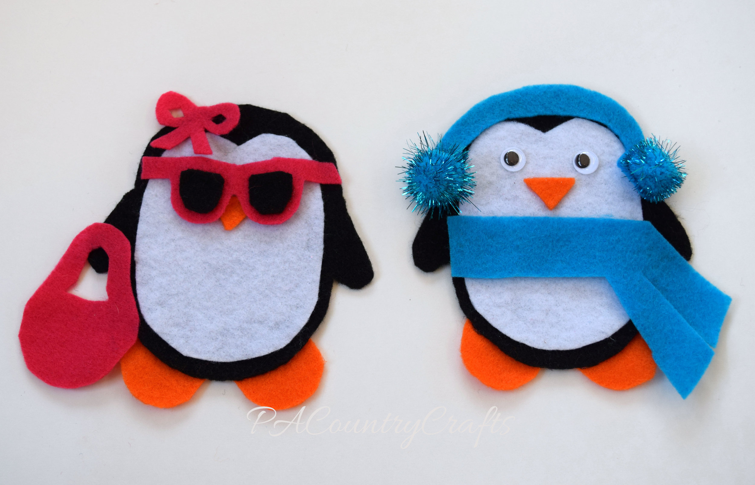 Toddler activity- play dress-up with felt penguins.