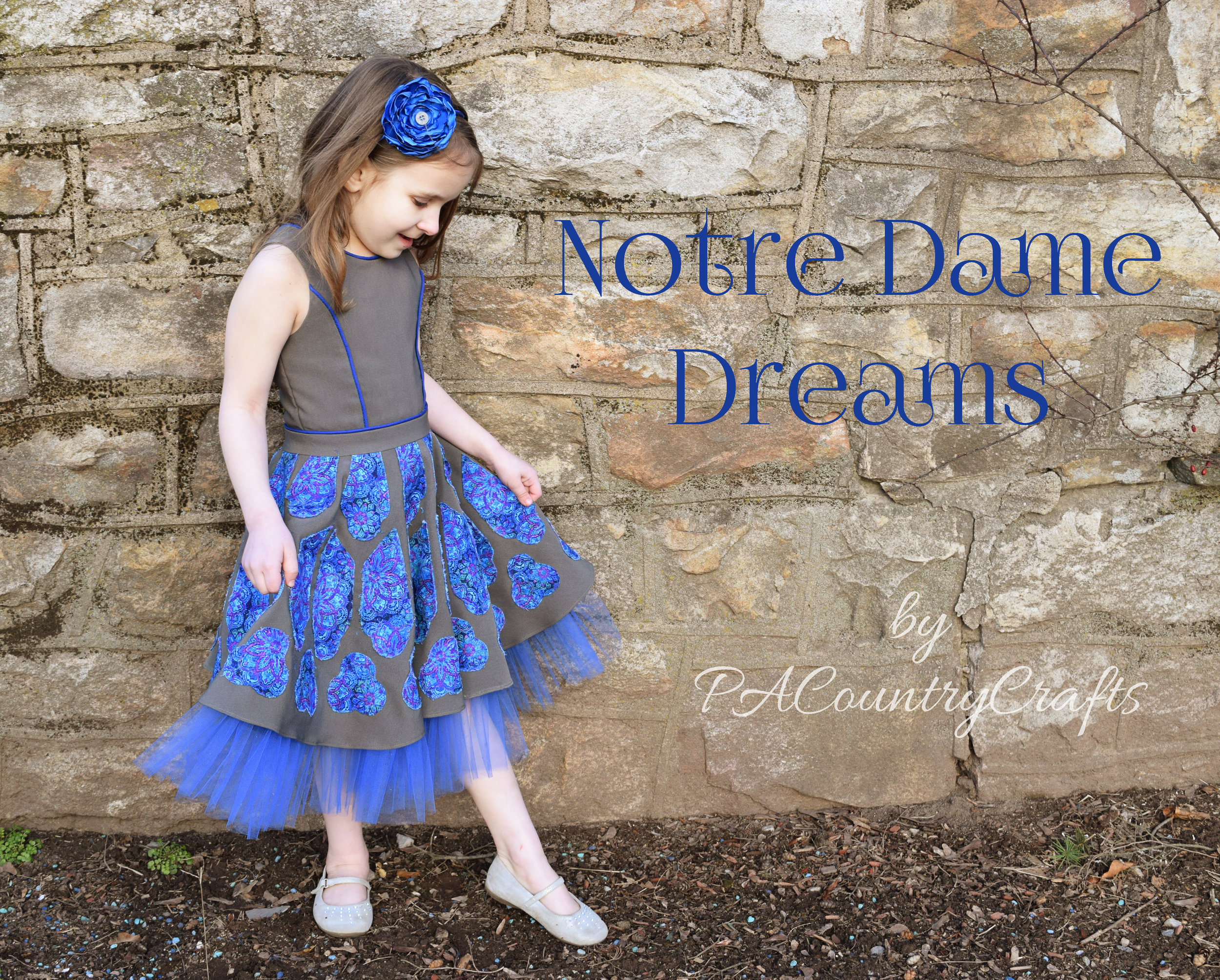 A Notre Dame cathedral inspired dress with an applique circle skirt.