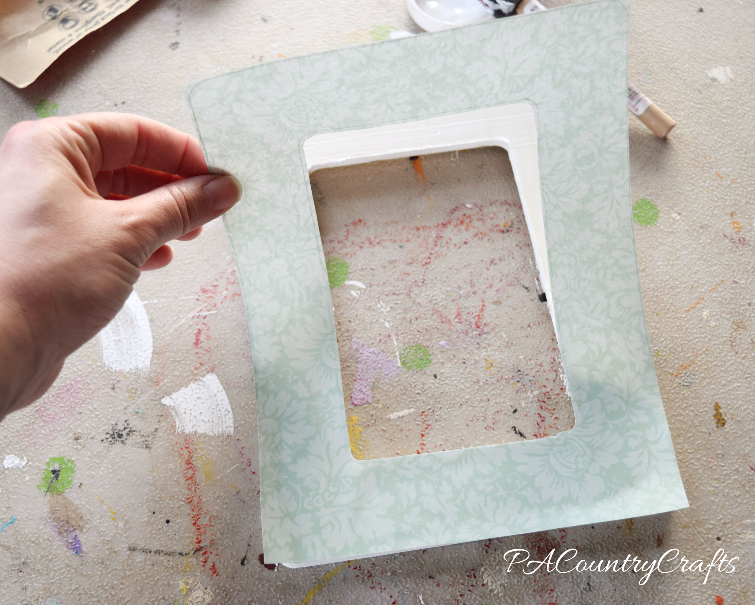 How to cover a wooden frame with paper