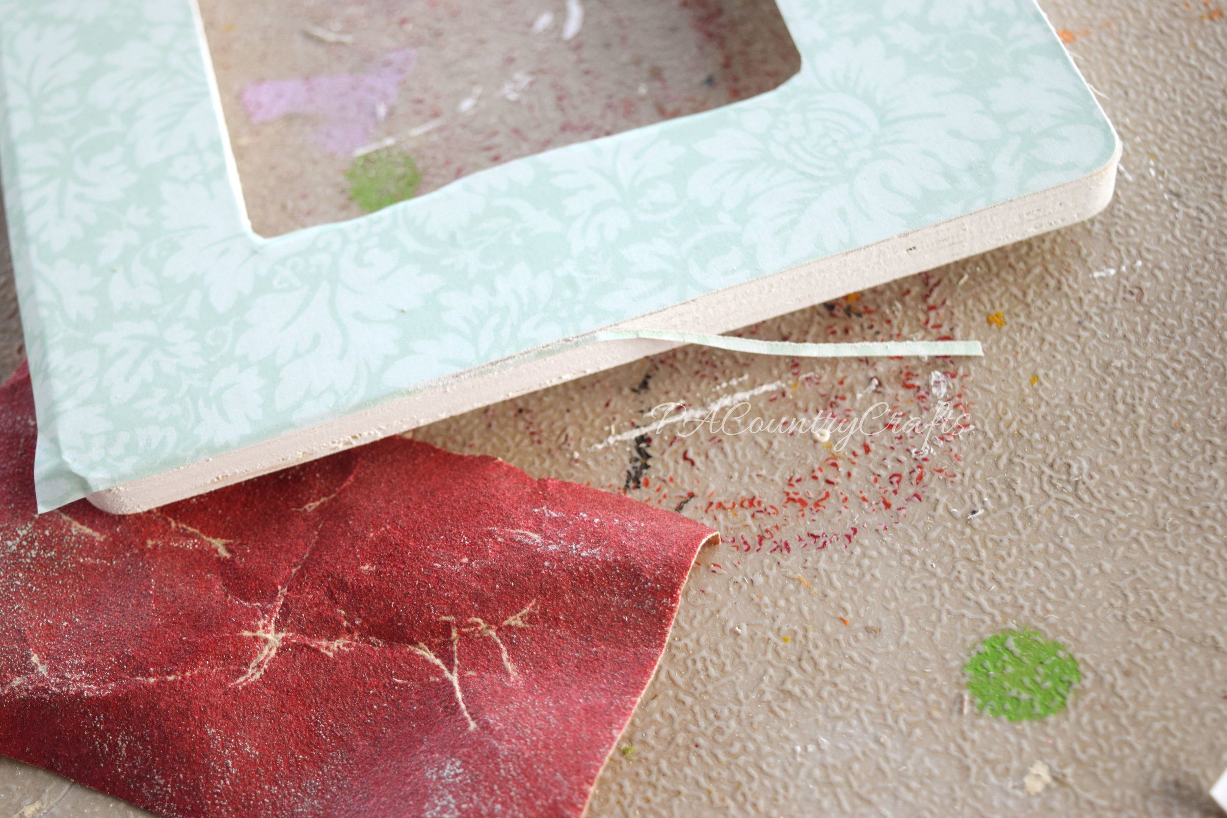 The secret to getting perfect edges on mod podge picture frames...