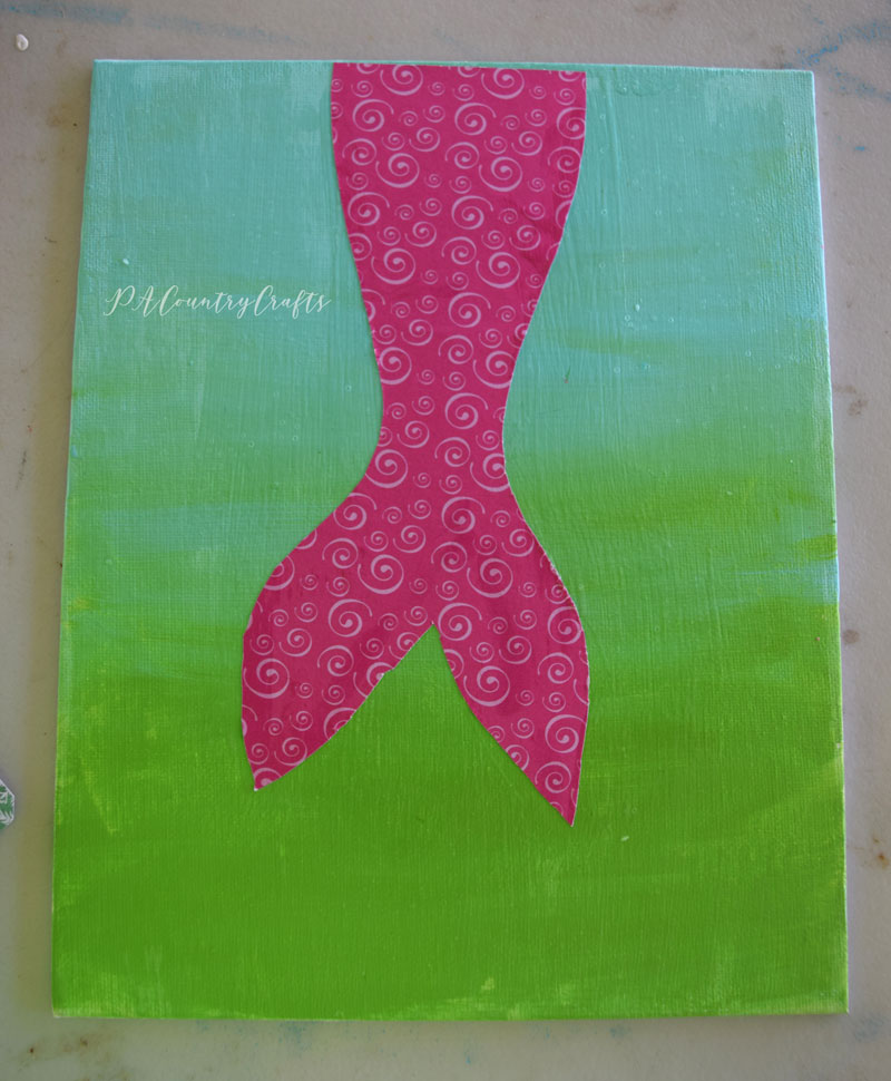 Mermaid kids paint class- mod podge the tail with scrapbook paper