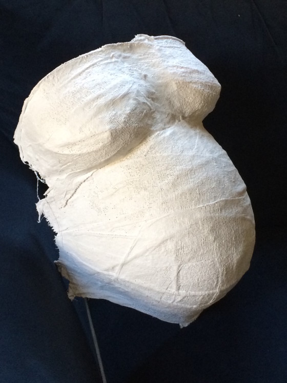 A plaster version of my torso at week 36, inspired by Birthing from Within.