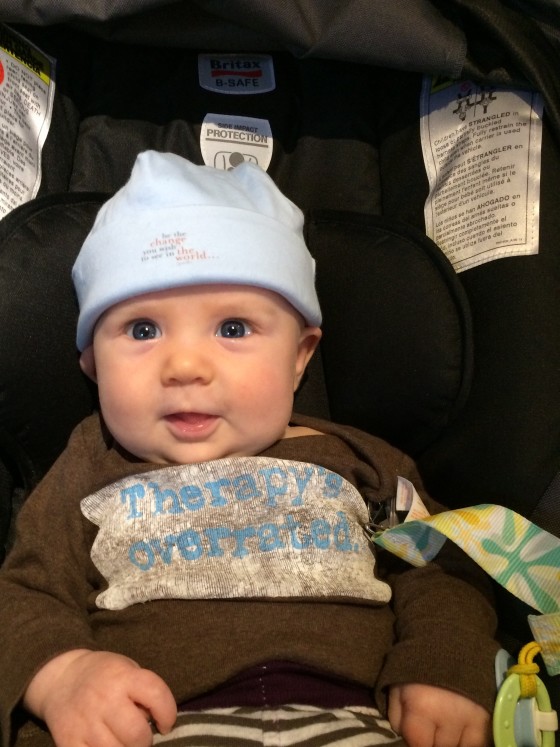 Gandhi hat quote accompanied by the best onesie for a therapist parent all on a happy baby!