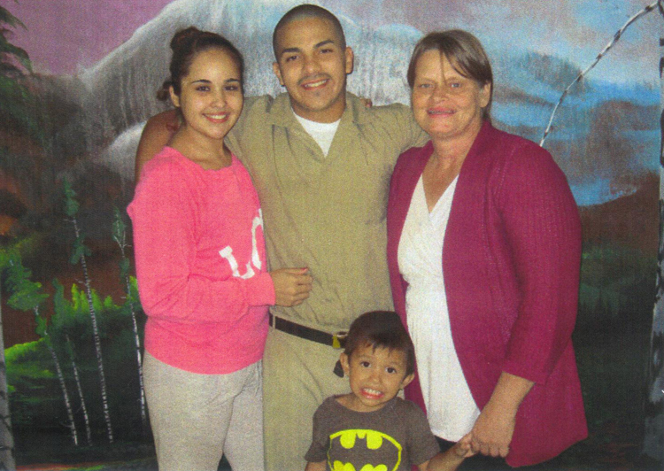 Anthony's girlfriend Erika, Anthony, Cheryle, and Anthony's cousin Hunter Abul-Husn at the Wabash County Correctional Center, Indiana. Image courtesy Cheryle Abul-Husn.