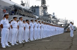 Japanese officers aboard the Japanese Maritime Self-Defense Force (JMSDF) training vessel JDS Kashima (TV 3508) stand in ranks after docking in Pearl Harbor, Hawaii. May 4, 2004. (Wikimedia Commons)