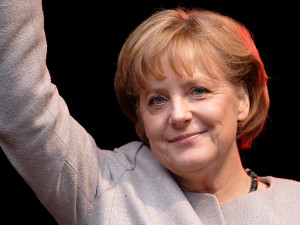 German Chancellor Angela Merkel waves to supporters.