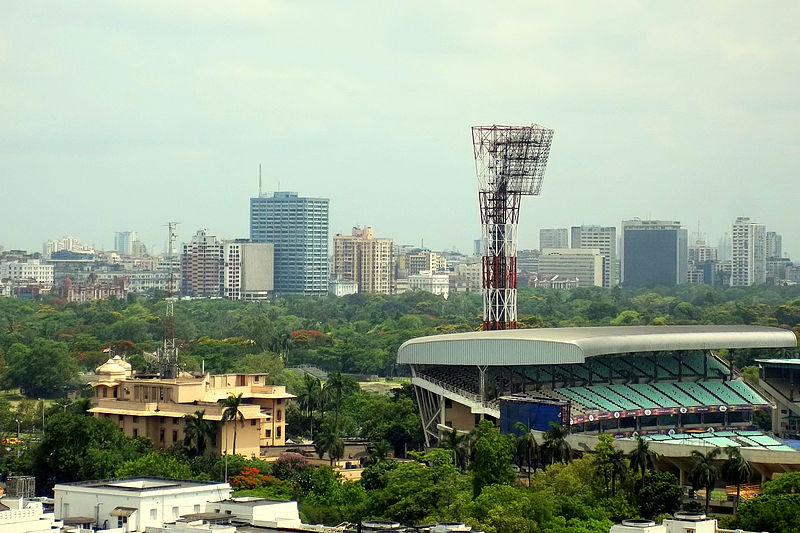 A view of the skyline of Kolkata including Chatterjee International Center, Tata Center, and the Eden Gardens.