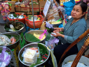 This woman has been selling her sticky rice on the streets of Saigon for years. Image: Hannah Everett. 