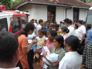 Wikimedia Commons: A doctor checking a child in Sri Lanka.