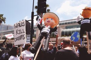 Anti-Trump protestors condemn Trump's wall proposal and rhetoric regarding Mexican immigrants