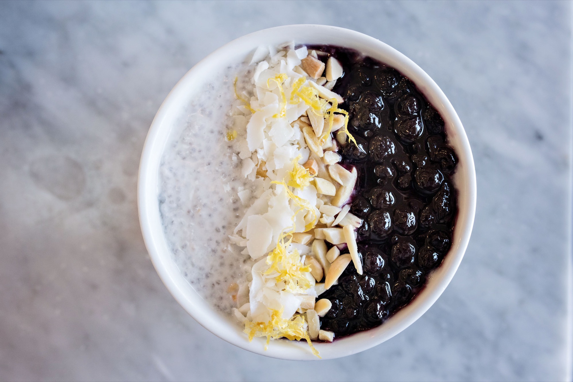 Coconut Chia Seed Pudding with coconut flakes, crushed almonds, and blueberry-lemon compote / Photo by D'Ann McCormick Boal