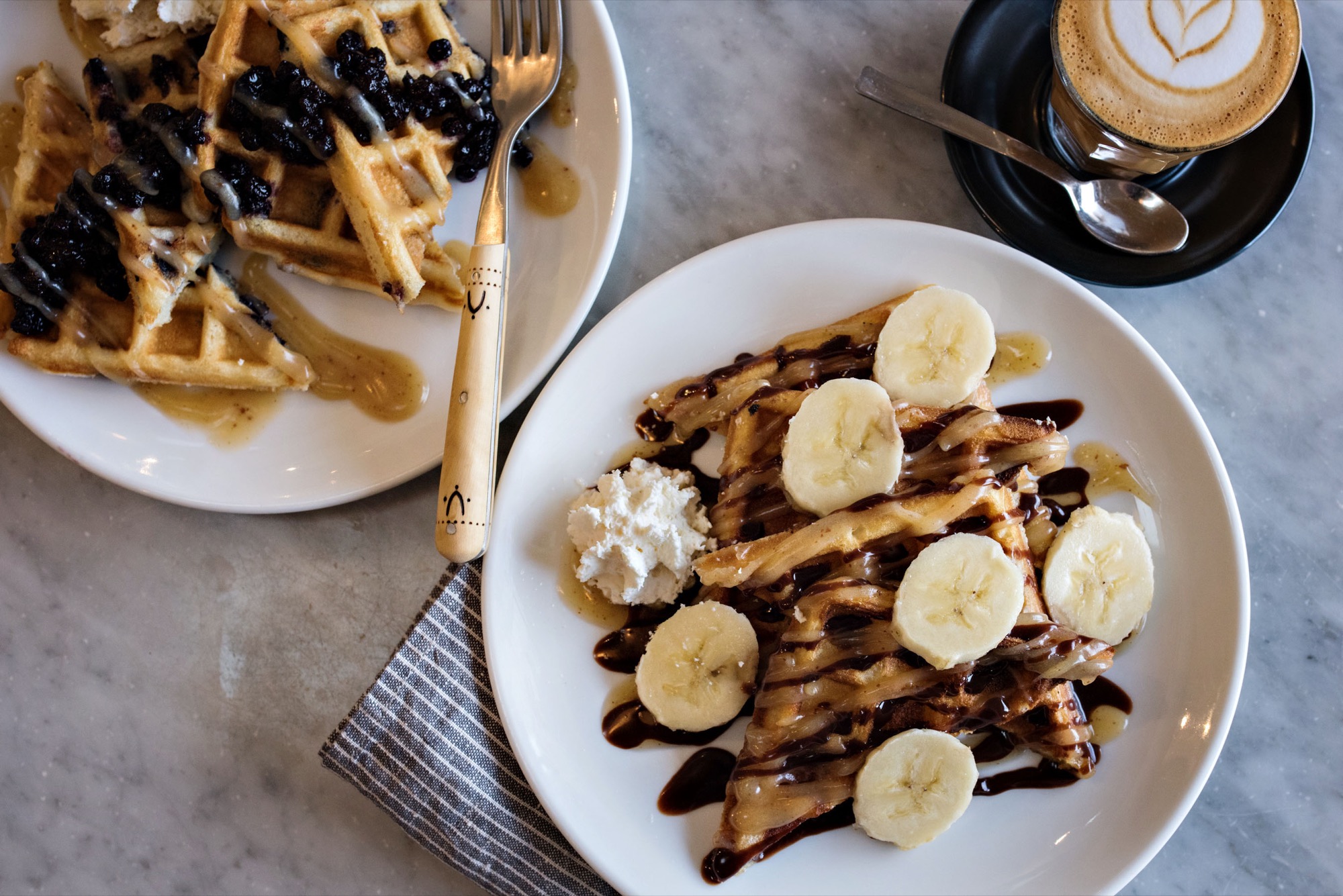 L: Blueberry Waffle with maple brown butter / R: Nutella Banana Waffle with maple brown butter / Photo by D'Ann McCormick Boal