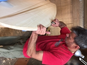 An enthusiastic new woodworker making his hollow wooden board