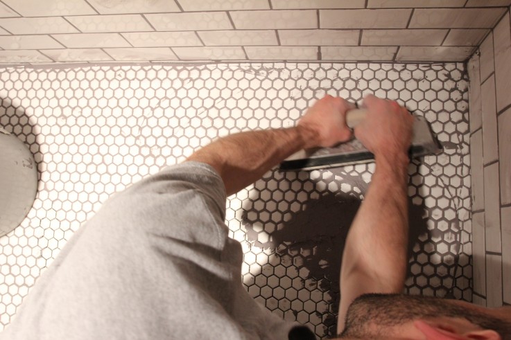 Husband Grouting Tile Floor